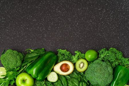 Selection of healthy green food fresh vegetables and fruitの写真素材