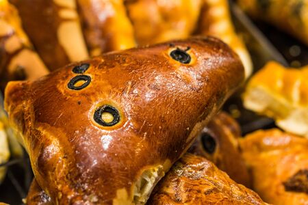 Focaccia bread pastry with olives at a farmers market