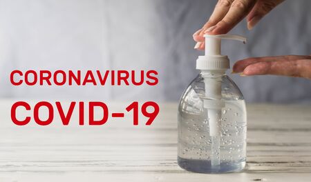 Hand sanitizer for prevention of coronavirus pandemic with letters coronavirus.の写真素材