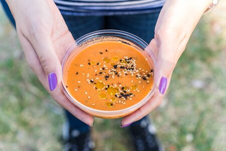 Traditional Spanish gazpacho cold tomato soup at a street food market.の写真素材