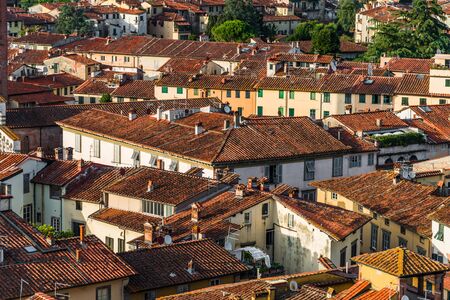 View at ancient Italian town with colorful houses in Tuscany from above.の写真素材