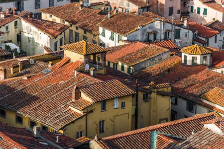 View at ancient Italian town with colorful houses in Tuscany from above.の写真素材