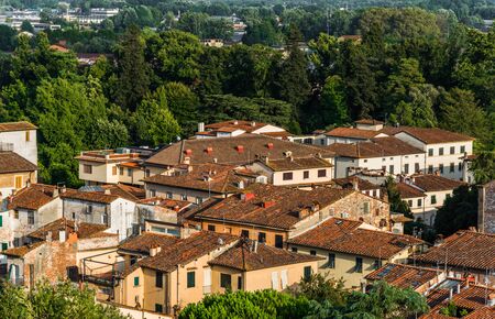 View at ancient Italian town with colorful houses in Tuscany from above.の写真素材
