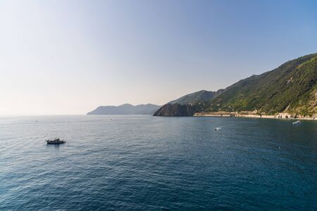 View at Ligurian Sea coastline in Liguria, Italy, with aquamarine water.の写真素材