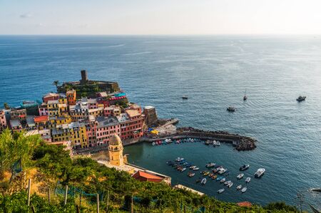 Vernazza village, Italy, with its colorful houses and Ligurian Sea coast.の写真素材