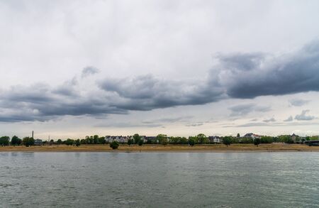 View at Oberkassel neighborhood and Rhine river in Dusseldorf, Germany.の写真素材