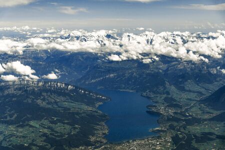 Landscape aerial view of Zurich, Switzerland, lake Zurich, hills and fields.