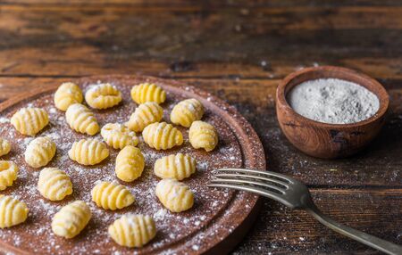 Making gnocchi, traditional Italian pasta food made of potatoes and flour.の写真素材