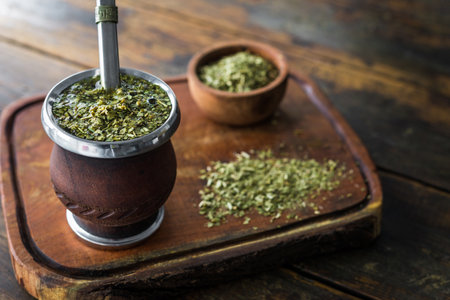 Traditional Argentinian yerba mate tea in a calabash gourd with bombilla stick.の写真素材