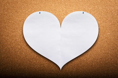 Paper White Heart on Cork Backgroundの写真素材
