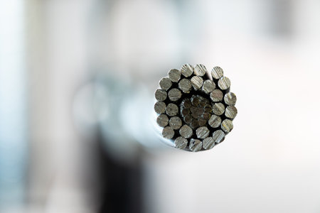 High voltage electric cable cross section on blurred bokeh backgroundの写真素材