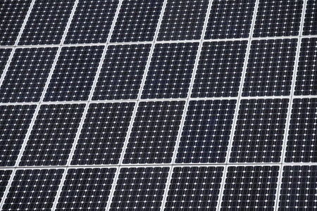 Solar photovoltaic panels detail on roofの写真素材
