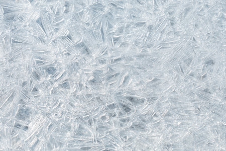 Frozen water crystals background, top view