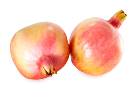Fresh ripe pomegranate fruit isolated on white background.の写真素材