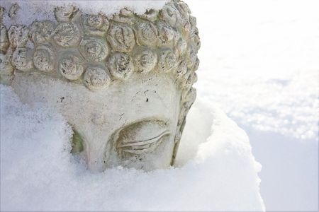 Buddha in snowの写真素材