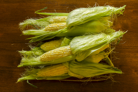 sweetcorn on a plateの写真素材