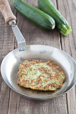 Zucchini fritter in a panの写真素材