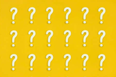 Set with question mark icons on orange background. Artificial model, mock-up of interrogation point. Question, doubt, asking concept.の写真素材