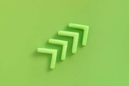 Arrows pointing up, green color. Concept of development, profit, progress. Arrow upwards show growing of the business, success of ecological marketing.の写真素材