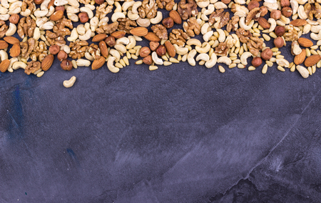 Assorted nuts background copy space. Selective focus.の写真素材