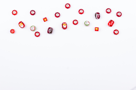 Christmas glass beads for handmade on white background. Top view. Space for text.の写真素材