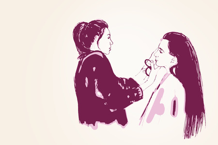 Woman visagist makeup artist paints on the face of his client. Illustration 
の写真素材