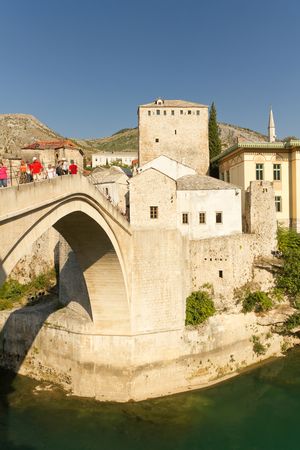 Tourists Strolling Across the Historic Old Bridge On September 24, 2010 in Mostar, Bosnia and Herzegovinaのeditorial素材
