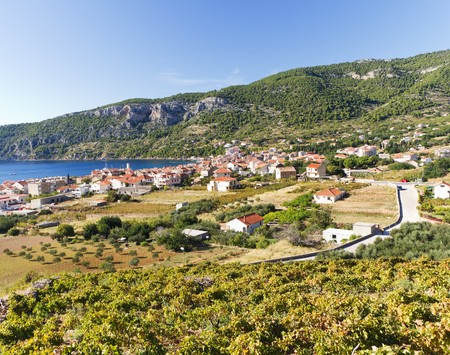 Town of Komiza in Vis Island, Croatia in the Adriatic Seaの写真素材