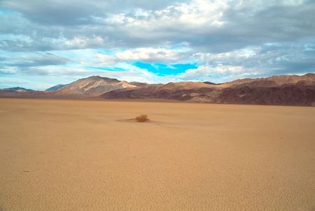 Racetrack Playa is a seasonally dry lake (a playa) located in the northern part of the Panamint Mountains in Death Valley National Park, California, U.S.A.. It is famous for 'sailing stones', rocks that mysteriously move across its surface.の写真素材