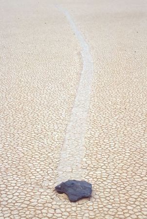 Racetrack Playa is a seasonally dry lake (a playa) located in the northern part of the Panamint Mountains in Death Valley National Park, California, U.S.A.. It is famous for 'sailing stones', rocks that mysteriously move across its surface.の写真素材