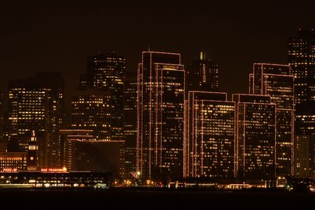 San Francisco is a popular international tourist destination renowned for its summer fog, steep rolling hills, eclectic mix of Victorian and modern architecture and its famous landmarks, including the Golden Gate Bridge, the cable cars, and Chinatown.の写真素材