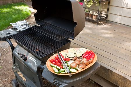 Grilling is a form of cooking that involves dry radiant heat from above or below, and takes place on a grill or griddleの写真素材