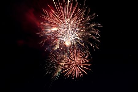 Firework is a low explosive pyrotechnic device used primarily for aesthetic and entertainment purposes.の写真素材