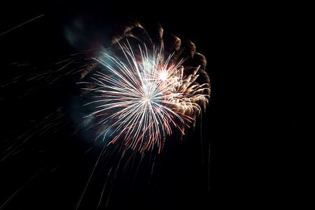 Firework is a low explosive pyrotechnic device used primarily for aesthetic and entertainment purposes.の写真素材