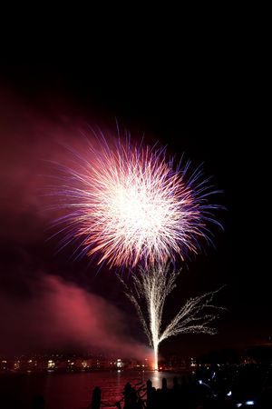 Firework is a low explosive pyrotechnic device used primarily for aesthetic and entertainment purposes.の写真素材