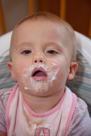 High chair is a piece of furniture used for feeding older babies and younger toddlers.の写真素材