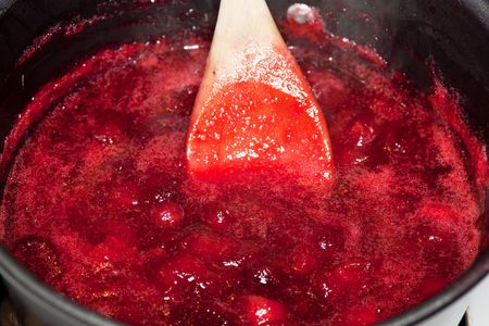 Cranberry sauce is a sauce or relish made out of cranberries, commonly associated with Thanksgiving dinner in North America.の写真素材