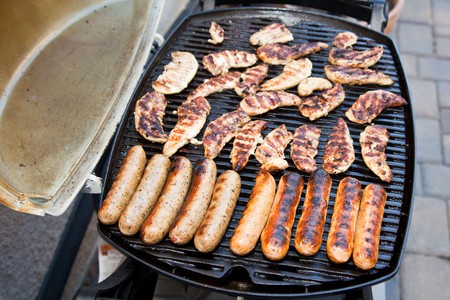 Grilling is a form of cooking that involves dry radiant heat from above or below, and takes place on a grill or griddleの写真素材