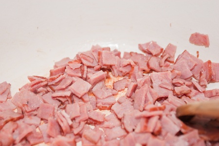 Turkey bacon is a meat product usually prepared from smoked, chopped and reformed turkey and commonly marketed as a low-fat alternative to traditional pork bacon.の写真素材