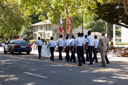 SAN JOSE, CA, USA - JULY 4: 4th of July Rose, White and Blue Parade. It is a two mile route that winds through some great old neighborhoods in the Rose Garden District July 4, 2011 in San Jose, CA, USAのeditorial素材