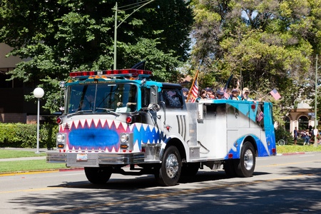 SAN JOSE, CA, USA - JULY 4: 4th of July Rose, White and Blue Parade. It is a two mile route that winds through some great old neighborhoods in the Rose Garden District July 4, 2011 in San Jose, CA, USAのeditorial素材