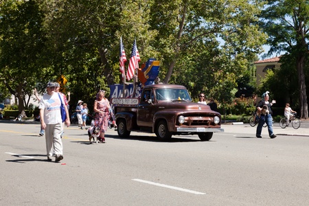 SAN JOSE, CA, USA - JULY 4: 4th of July Rose, White and Blue Parade. It is a two mile route that winds through some great old neighborhoods in the Rose Garden District July 4, 2011 in San Jose, CA, USAのeditorial素材