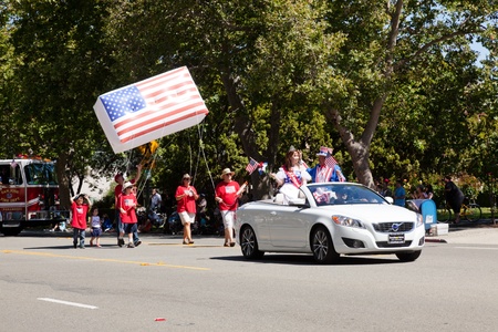 SAN JOSE, CA, USA - JULY 4: 4th of July Rose, White and Blue Parade. It is a two mile route that winds through some great old neighborhoods in the Rose Garden District July 4, 2011 in San Jose, CA, USAのeditorial素材