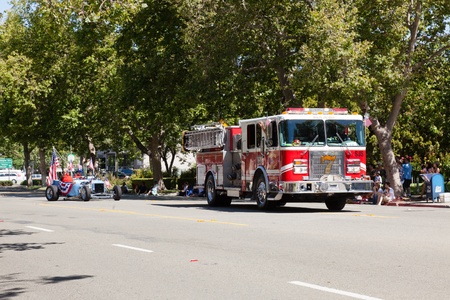 SAN JOSE, CA, USA - JULY 4: 4th of July Rose, White and Blue Parade. It is a two mile route that winds through some great old neighborhoods in the Rose Garden District July 4, 2011 in San Jose, CA, USAのeditorial素材