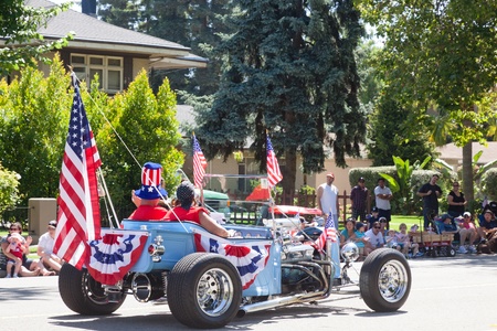 SAN JOSE, CA, USA - JULY 4: 4th of July Rose, White and Blue Parade. It is a two mile route that winds through some great old neighborhoods in the Rose Garden District July 4, 2011 in San Jose, CA, USAのeditorial素材