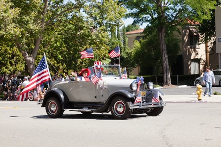 SAN JOSE, CA, USA - JULY 4: 4th of July Rose, White and Blue Parade. It is a two mile route that winds through some great old neighborhoods in the Rose Garden District July 4, 2011 in San Jose, CA, USAのeditorial素材