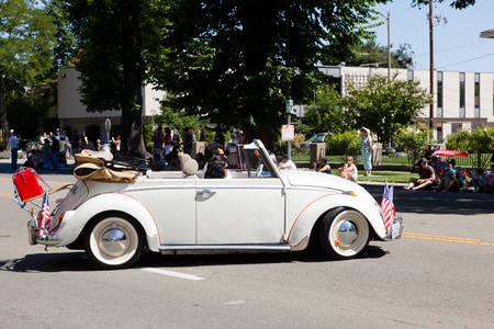 SAN JOSE, CA, USA - JULY 4: 4th of July Rose, White and Blue Parade. It is a two mile route that winds through some great old neighborhoods in the Rose Garden District July 4, 2011 in San Jose, CA, USAのeditorial素材