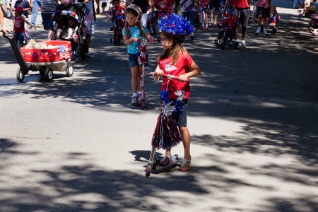 SAN JOSE, CA, USA - JULY 4: 4th of July Rose, White and Blue Parade. It is a two mile route that winds through some great old neighborhoods in the Rose Garden District July 4, 2011 in San Jose, CA, USAのeditorial素材
