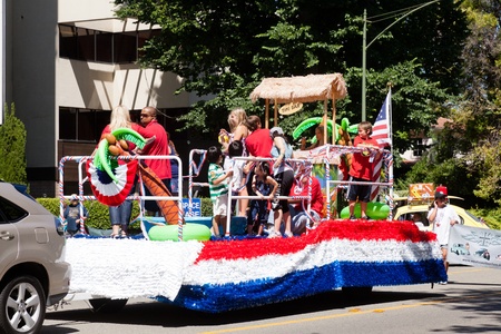 SAN JOSE, CA, USA - JULY 4: 4th of July Rose, White and Blue Parade. It is a two mile route that winds through some great old neighborhoods in the Rose Garden District July 4, 2011 in San Jose, CA, USAのeditorial素材