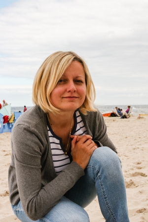 Natural light portrait of attractive European woman on a beachの写真素材